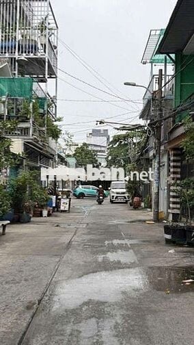 Nhà mặt tiền hẻm thông buôn bán.4 phòng ngủ.sân thượng