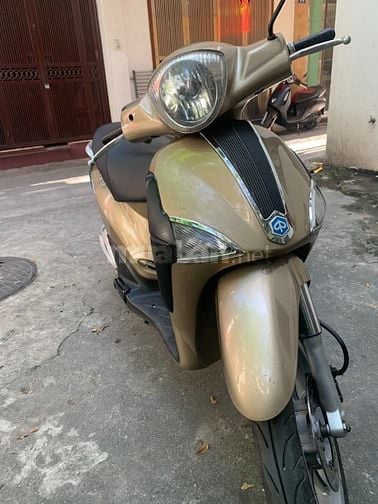 Cần bán xe Piaggio Liberty Việt Nam ăn ít xăng màu kaki biển 29D1