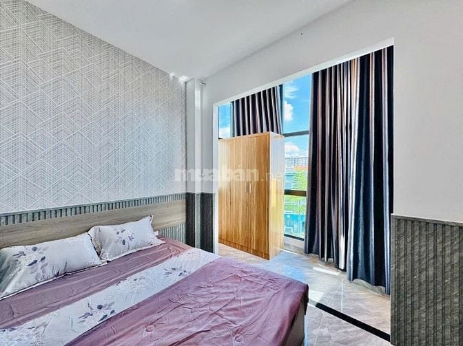 CHDV kết hợp nhà phố (4*16) 1 trệt 4 lầu thang máy đường 8m vỉa hè KD