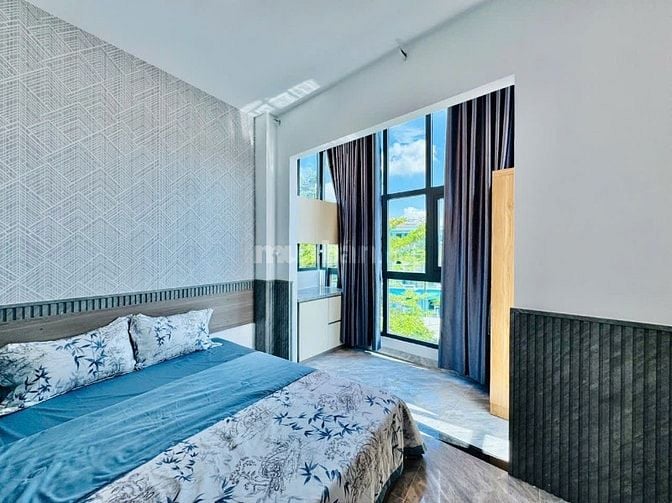 CHDV kết hợp nhà phố (4*16) 1 trệt 4 lầu thang máy đường 8m vỉa hè KD