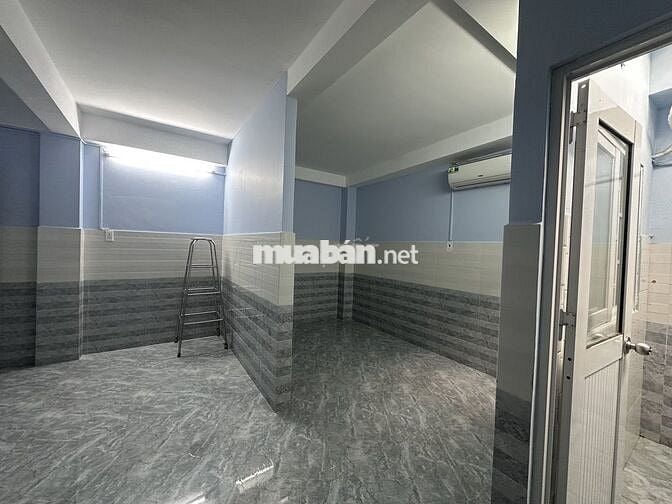 Nhà trọ 30m2 đường Phạm Văn Hai Q. Tân Bình, gần chợ PV2