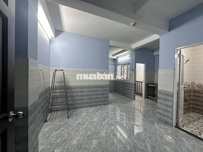 Nhà trọ 30m2 đường Phạm Văn Hai Q. Tân Bình, gần chợ PV2