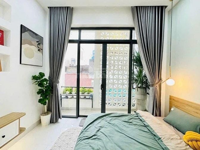 Cơ hội hiếm: Nhà HXH 6m Đất Thánh, Tân Bình – 4 phòng ngủ, 4WC, 2 tầng