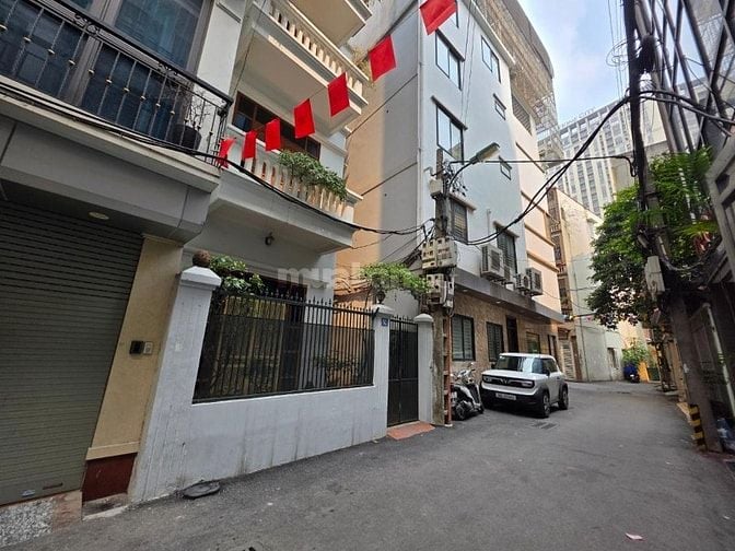 Mạc Thái Tổ,106m 6tầng, 2 ô tô tránh đỗ ,vào nhà. Giá 31,5 tỷ có TL.
