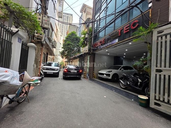 Mạc Thái Tổ,106m 6tầng, 2 ô tô tránh đỗ ,vào nhà. Giá 31,5 tỷ có TL.