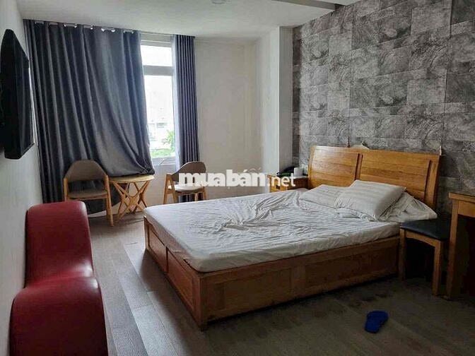 bán gấp toà nhà kd căn hộ dịch vụ khu trung sơn