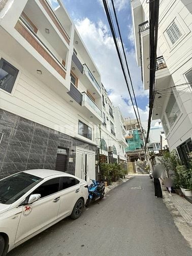Nơ Trang Long, P7 BT - hẻm nhựa 8m, ô tô đậu ngày đêm - 4 tầng 4pn