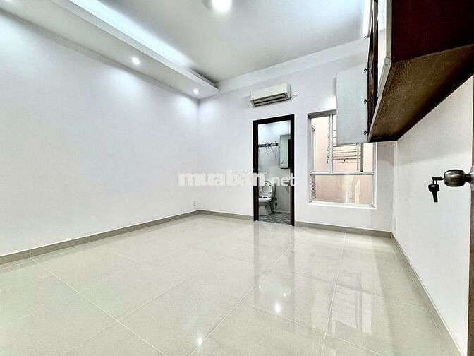 Gần chợ Bà Chiểu!HXH 5m sát MT Lê Quang Định - 4.8x12m nở hậu - 5tầng.