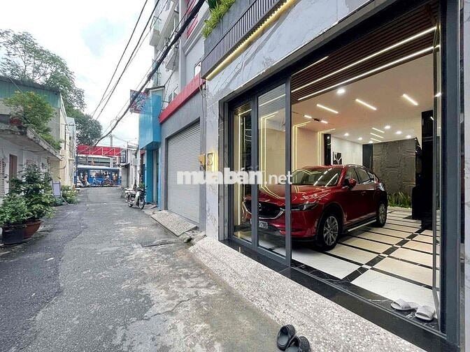 Nhà đẹp 5 tầng kiên cố oto vào nhà sát mặt tiền quang trung gần tsn