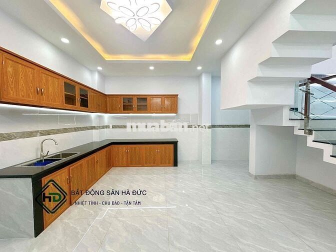 Nhà trệt lửng 3 lầu 5x14 mới 100% có gara xe hơi