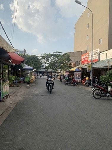 Nhà MT đs 12 m, L.P Man Quận 7. 6,4*21, chỉ 10 tỷ. Xd hầm cao tầng.