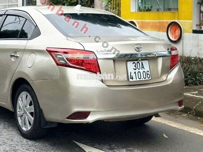 Toyota Vios 2014 1.5E - màu vàng đồng