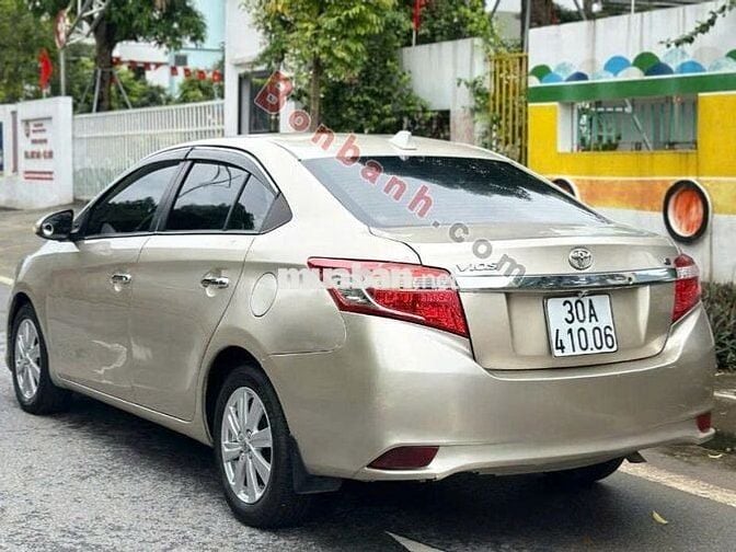 Toyota Vios 2014 1.5E - màu vàng đồng