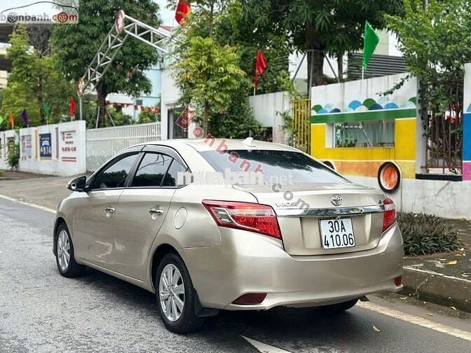 Toyota Vios 2014 1.5E - màu vàng đồng