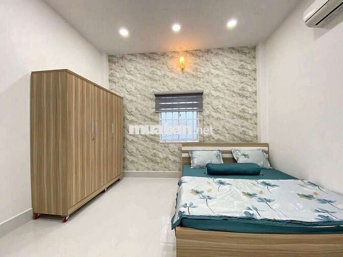 Bán nhà Hiệp Thành 45, dt 4x14 3 lầu, hẻm xe hơi thông.