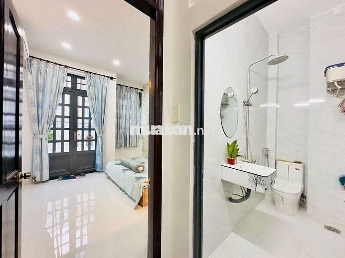 Bán nhà Hiệp Thành 45, dt 4x14 3 lầu, hẻm xe hơi thông.