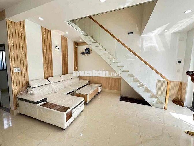 Cần bán nhà mới xây 1 trệt 1 lầu Diện Tích sổ 132m2 , gần chợ Tân Vạn