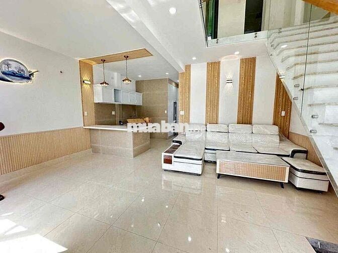 Cần bán nhà mới xây 1 trệt 1 lầu Diện Tích sổ 132m2 , gần chợ Tân Vạn