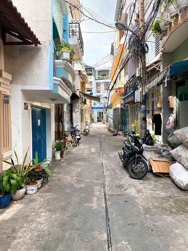 Nhà 2 mặt tiền trước sau, 77 Tân Quy, DT ~ 30m2