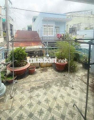 Bán nhà trệt lầu gỗ sân thượng trung tâm Long Xuyên giá 1,4 tỷ