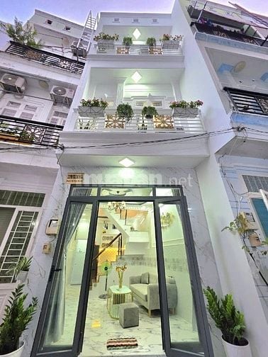 Nhà bán sổ hồng 2 lầu hẻm xe hơi. Gần Phú Mỹ Hưng quận 7