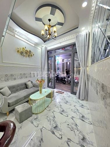 Nhà bán sổ hồng 2 lầu hẻm xe hơi. Gần Phú Mỹ Hưng quận 7