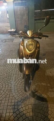Ban xe mio clacsico màu nâu trắng