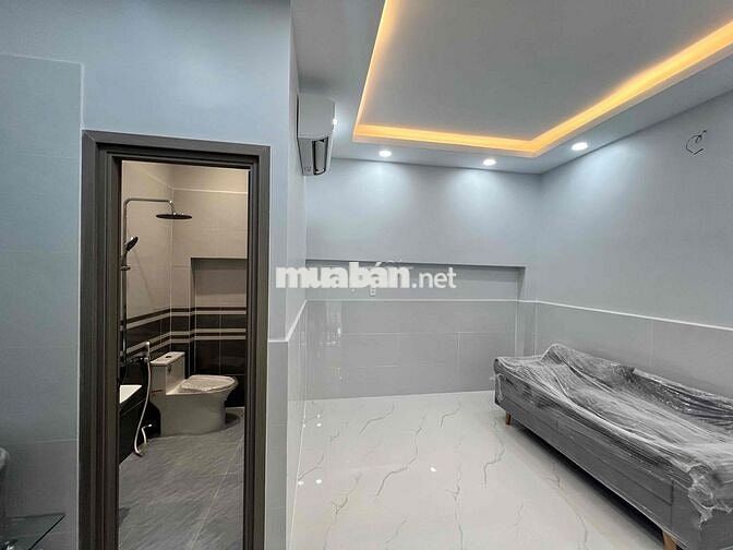 BÁN CĂN NHÀ 1 TRỆT 1 LẦU NGAY HUỲNH TẤN PHÁT