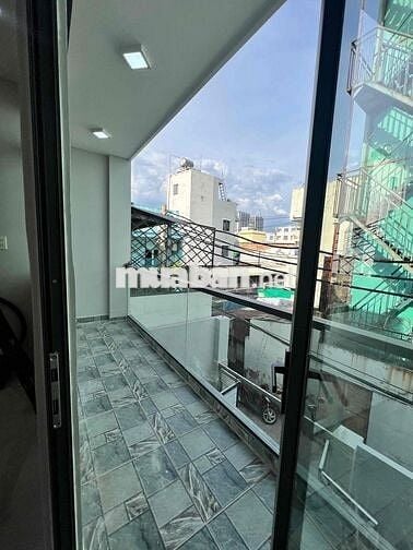 BÁN CĂN NHÀ 1 TRỆT 1 LẦU NGAY HUỲNH TẤN PHÁT