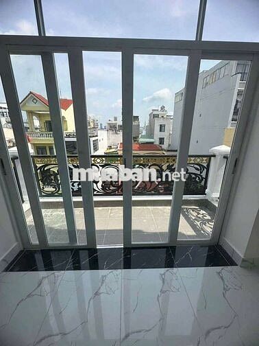 CHDV Mặt tiền Tân Quy 15 phòng thang máy ngang 6.5m hầm lửng 4 lầu st