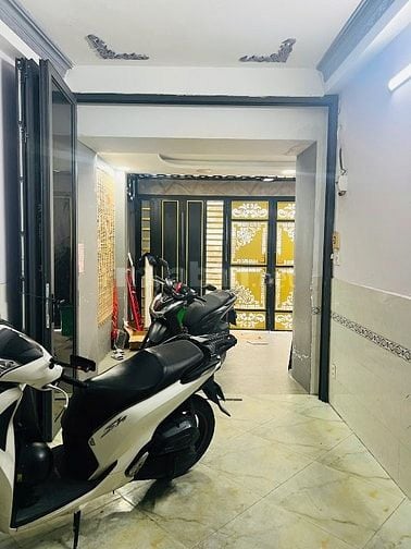 Hẻm xe hơi Thích Q Đức,Ngang 5,6m,4Tầng,9PN,Nở Hậu 8,5m,Thu nhập tốt 
