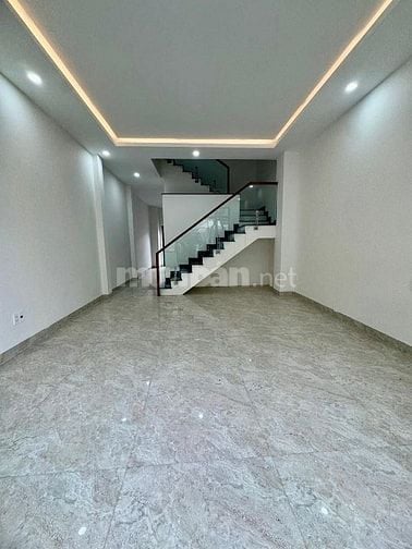 Nhà Tân Phước Khánh - Tân Uyên, mặt tiền kinh doanh TT 990tr ở liền