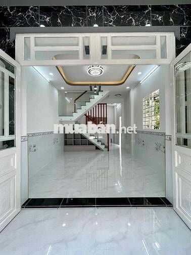 Nhà shc sau lưng Chợ Hóc Môn 4x11m 1 trệt 1 lầu  2pn 2wc sân thựợng