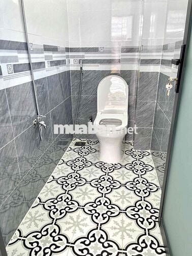 Nhà shc sau lưng Chợ Hóc Môn 4x11m 1 trệt 1 lầu  2pn 2wc sân thựợng