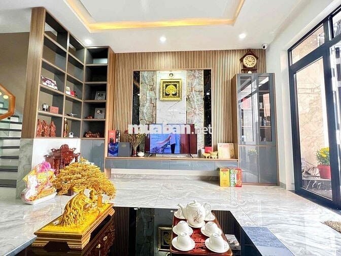 bán nhà 1tret 2 lâu mặt tiền dx 002 , phú mỹ . TDM , Bình Dương