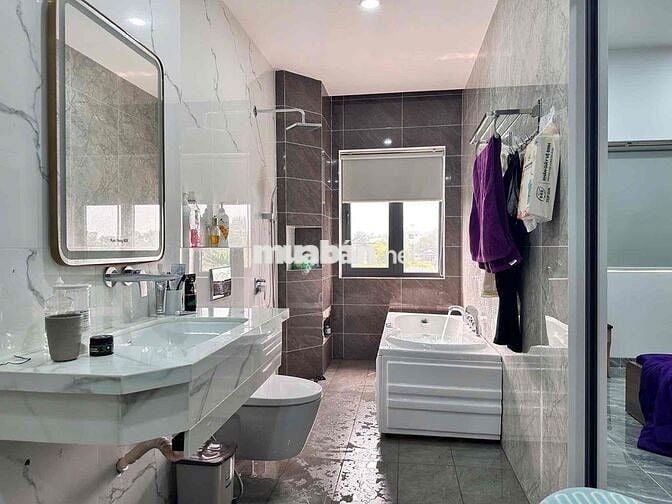 bán nhà 1tret 2 lâu mặt tiền dx 002 , phú mỹ . TDM , Bình Dương