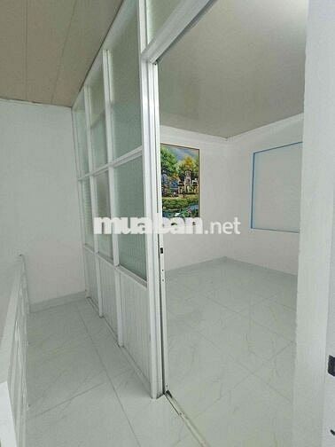 NHÀ 550TR NGAY MẶT TIỀN ĐƯỜNG 824 KẾ CẦU LỚN HÓC MÔN 40m2 sử dụng