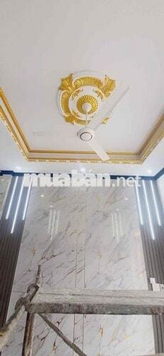 Căn nhà lầu trệt đồng sở hữu sân ô tô tại chợ Tân Phước khánh BD (củ)