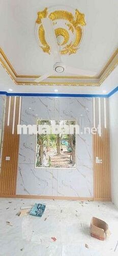 Căn nhà lầu trệt đồng sở hữu sân ô tô tại chợ Tân Phước khánh BD (củ)