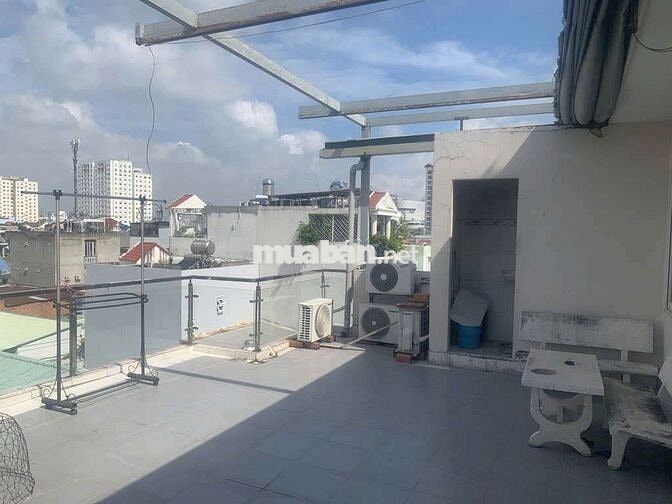 Nhà 1 hầm + 4 lầu có 15 phòng, HXH 8m dt 141m2 ngang 8m A4 hoàn công