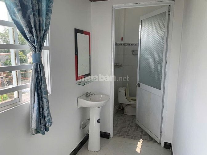Bán nhà 5x25m, 1 trệt 1 lầu mặt tiền đường nhựa xã Củ Chi. 