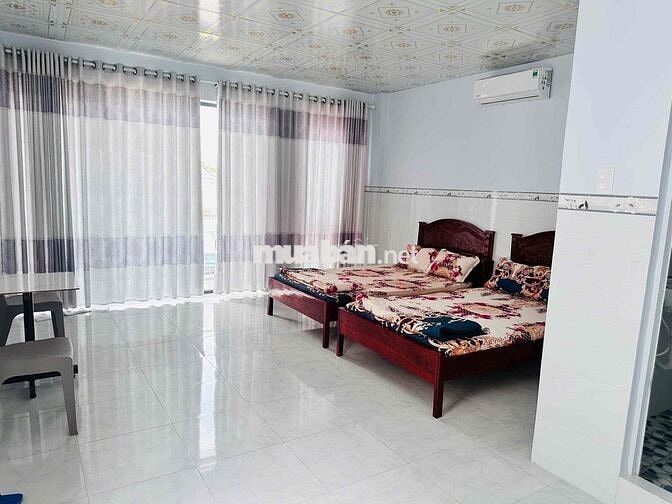 Cần bán nhà nghỉ mới - 9 phòng - kế siêu thị Go Trà vinh
