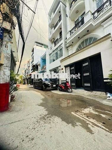 Nhà ngang 5m x 14,5m,đúc 5 tấm đường 6m thông xe hơi ngủ trong nhà