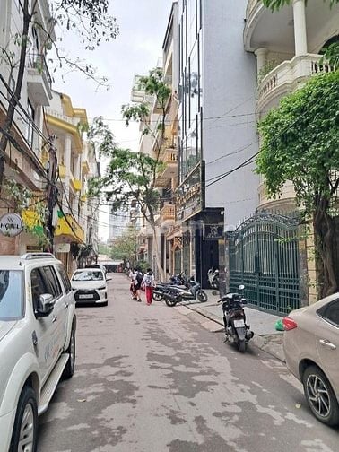 Mạc Thái Tổ,106m 6tầng, 2 ô tô tránh đỗ ,vào nhà. Giá 31,5 tỷ có TL.