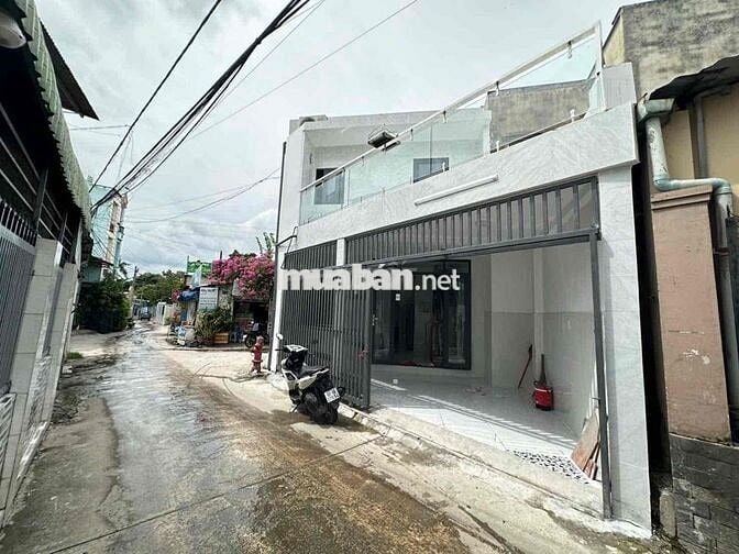 Cần bán nhà 1 trệt 1 lầu , đường xe tải thích họp kinh doanh tạp hoá