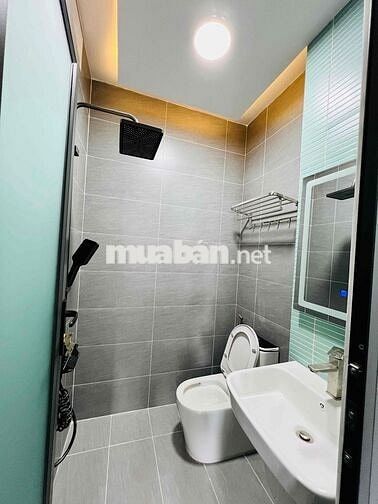 Nhà Mới Xây DT 250m2 1Trệt 1Lửng 3Lầu 5Pn 6Wc Hẻm Nhựa Xe Tải Vỉa Hè
