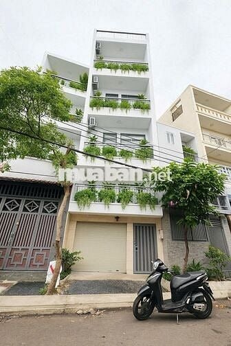 Mặt tiền 5 lầu Nguyễn Trường Tộ đang hoàn thiện mặt đường mới toanh