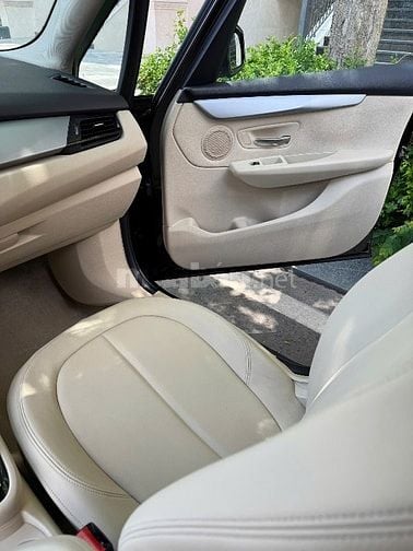 Bán BMW 218i sản xuất cuối 2015 lăn bánh 01.2016 , màu nâu nho đậm 