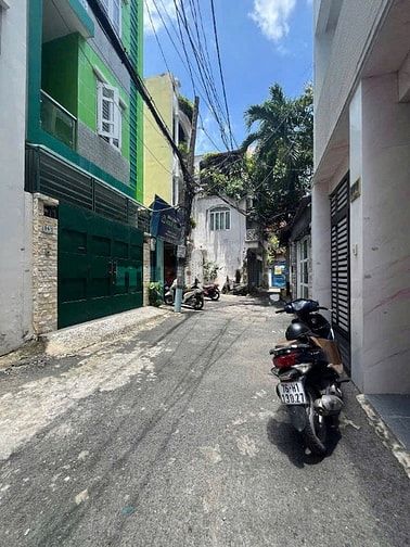HẠ GIÁ 400TR BÁN NHANH NHÀ HẺM 34 TĂNG BẠT HỔ CÓ GARA OTO - NHÀ MỚI 