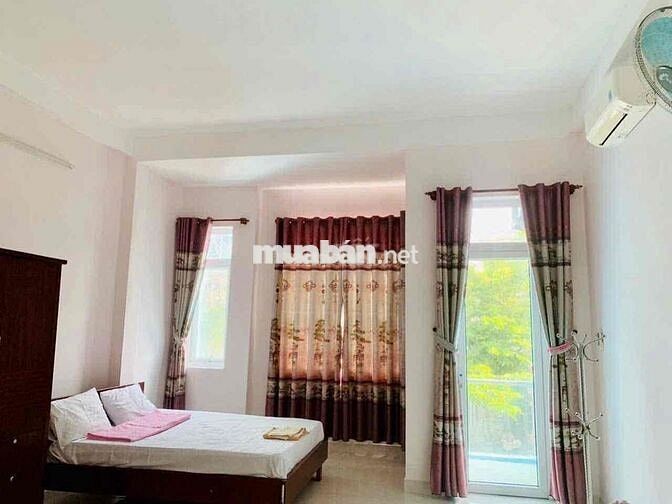 Nhà 3,5 tầng 10Phòng mặt tiền Đinh Công Trứ dòng tiền 45tr/tháng